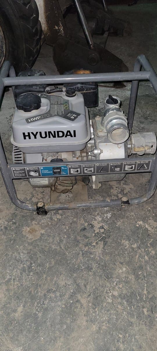 Discharge water pump with hoses for rent in Richmond Hill, Ontario — toolshare